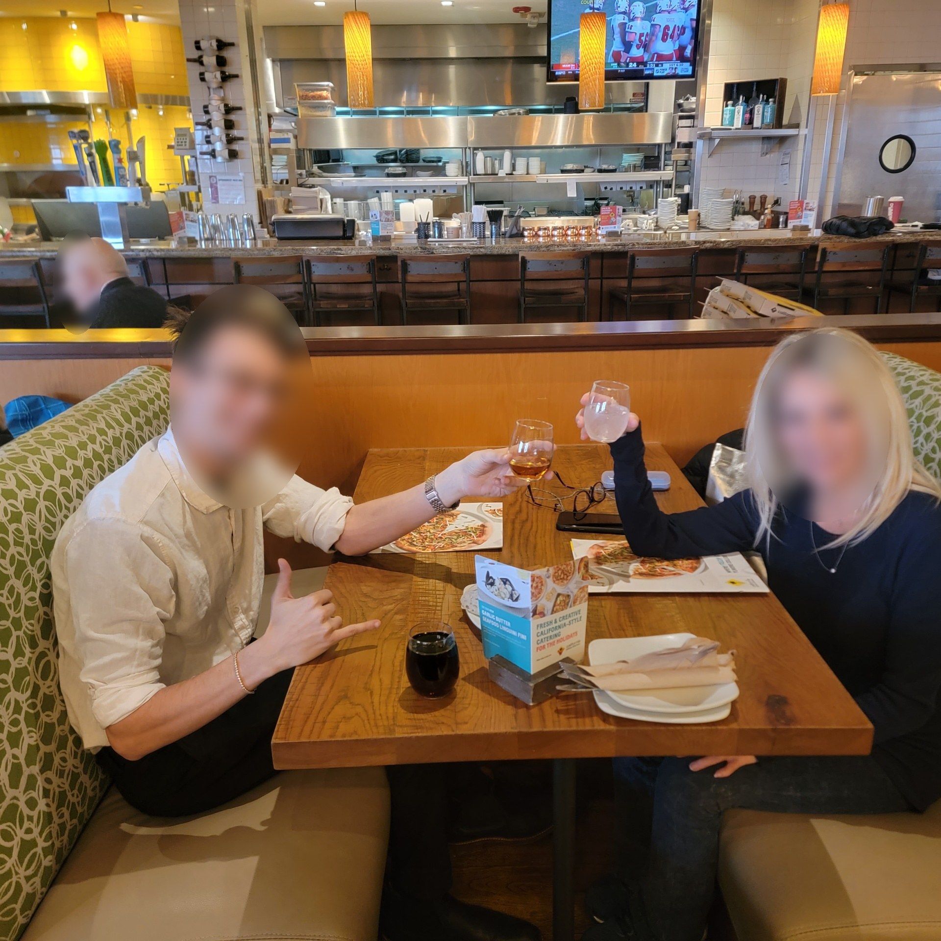 Salesperson sharing a celebratory toast with a customer